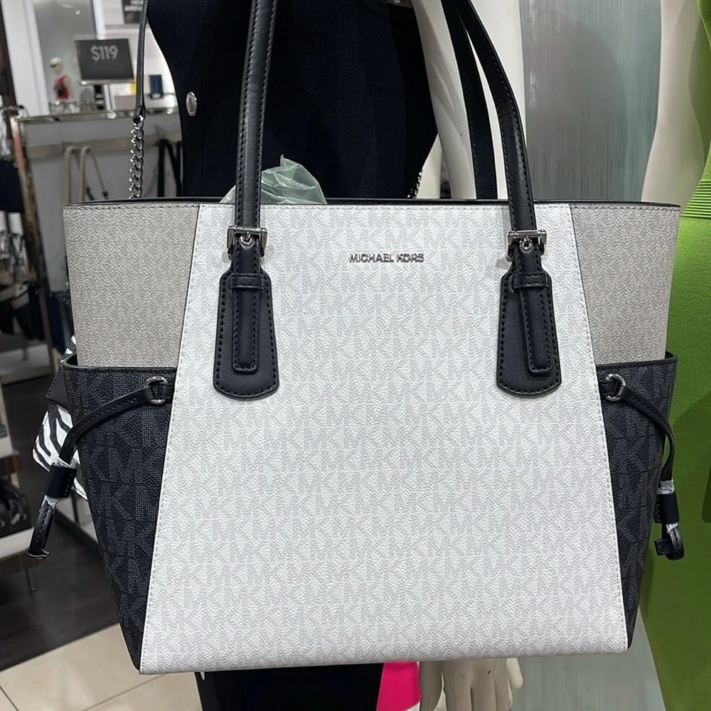 Michael Kors Voyager Large Color-Block Signature Logo Tote Bag
Optic White Mult - Picture 1 of 16